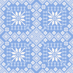 Seamless vector pattern with blue ice snowflakes for winter holiday design