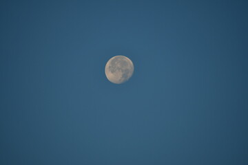 Full Moon in Blue Sky