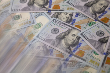 US 100 dollar banknotes background