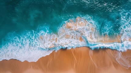 Create an aerial view of a sandy beach and the ocean with waves. Highlight the textures of the sand, the patterns of the waves, and the contrast between the beach and the ocean. Showcase the natural b