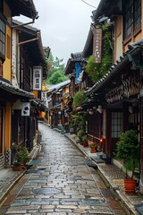 Fototapeta premium An empty narrow stone street in Japan with traditional houses on both sides