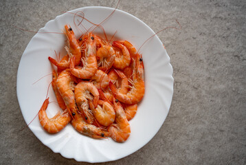 shrimps on a white plate