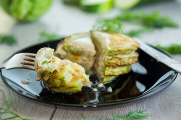 zucchini fried in batter with sauce