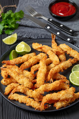 deep fried panko breaded shrimp on a plate