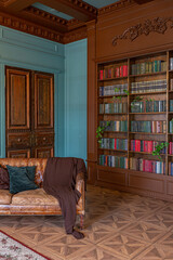 Luxury interior of home library. Sitting room with elegant furniture
