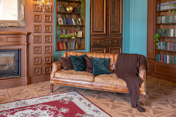 Luxury interior of home library. Sitting room with elegant furniture