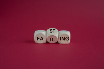 Fasting or failing symbol. Concept words Fasting or Failing on wooden cubes. Beautiful red background. Business fasting or failing concept.