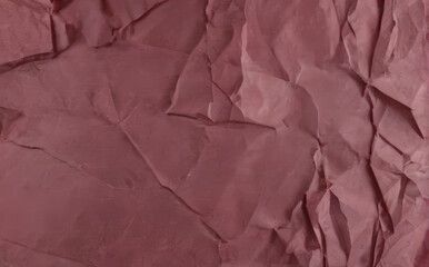 abstract background, wrinkled burgundy color textured paper