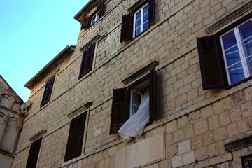curtain in a window in a historical town in Croatia