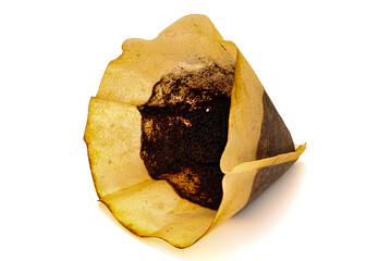 Used cone coffee filter on white