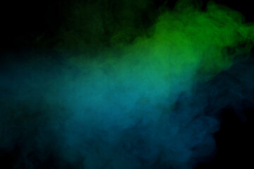 Blue and green steam on a black background.