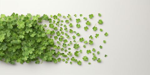 Fototapeta premium A green plant with leaves that are scattered all over the wall