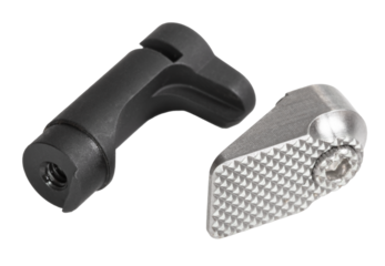 Oversize magazine release for a handgun