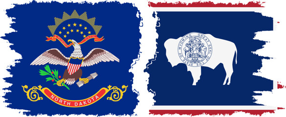 Wyoming and North Dakota states grunge brush flags connection, vector