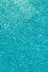 Blue pool reflecting sunlight