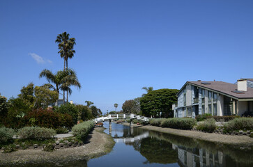 Obraz premium Canals of Venice in California with amazing houses, boats, palm trees on the shore