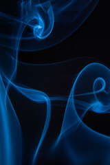 A photo of smoke that has a beautiful billowing appearance. Suitable for making background images.