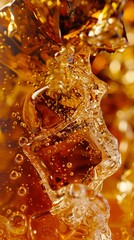 A close up of a glass of soda.