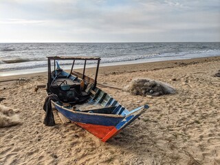 The fishing boat ran aground on the beach