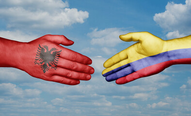 Colombia and Albania country handshaking with flags, consensus concept international co-operation illustration