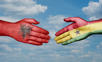 Ghana and Albania country handshaking with flags, consensus concept international co-operation illustration