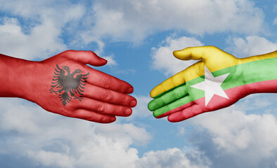 Myanmar aka Burma and Albania country handshaking with flags, consensus concept international co-operation illustration