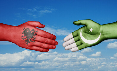 Pakistan and Albania country handshaking with flags, consensus concept international co-operation illustration