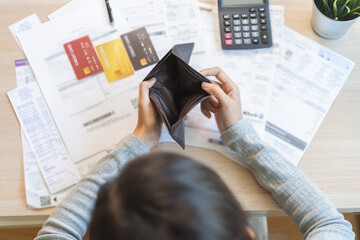 Debt financial concept, stressed problem asian woman hand open empty wallet, purse not have budget...