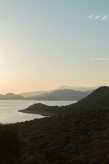 Sunset in the mountains with olive groves over the Mediterranean sea