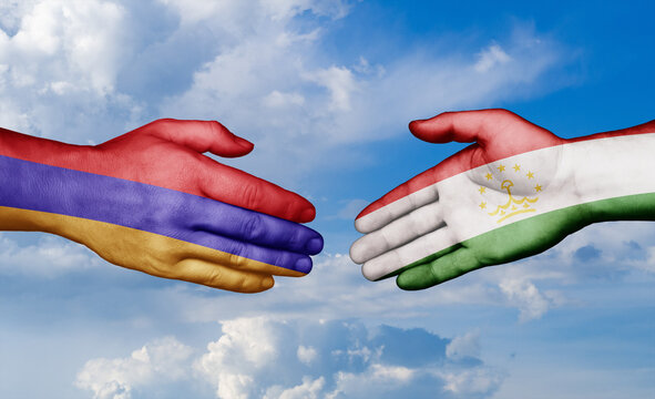 Tajikistan and ZXCV country handshaking with flags, consensus concept international co-operation illustration
