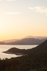 Sunset in the mountains with olive groves over the Mediterranean sea