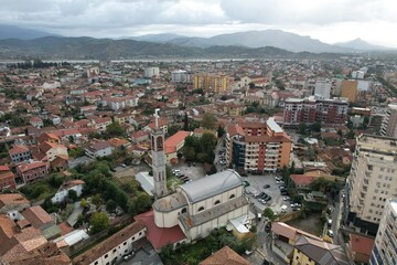 Fototapeta premium Skadar historical city with surrounding mountains and Skadar lake,Shkoder,Albania,Balkan,Europe,aerial panorama landscape view, cityscape