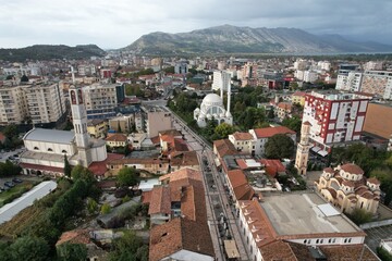 Fototapeta premium Skadar historical city with surrounding mountains and Skadar lake,Shkoder,Albania,Balkan,Europe,aerial panorama landscape view, cityscape