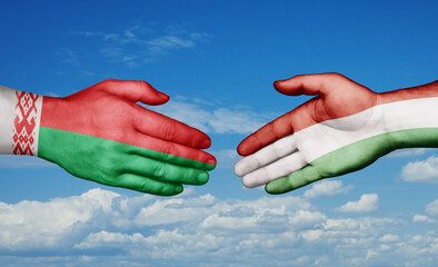 Hungary and Belarus country handshaking with flags, consensus concept international co-operation illustration