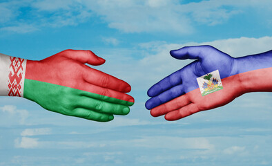 Haiti and Belarus country handshaking with flags, consensus concept international co-operation illustration