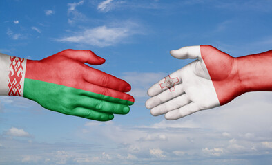 Malta and Belarus country handshaking with flags, consensus concept international co-operation illustration