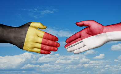 Indonesia and Belgium country handshaking with flags, consensus concept international co-operation illustration