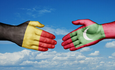 Maldives and Belgium country handshaking with flags, consensus concept international co-operation illustration