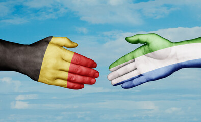 Sierra Leone or Salone and Belgium country handshaking with flags, consensus concept international co-operation illustration