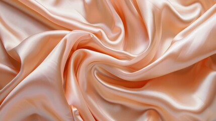 Obraz premium Tender peach beige silk satin fabric with soft drapery and gentle fold.