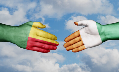 Ivory Coast or Cote d'Ivoire and Benin country handshaking with flags, consensus concept international co-operation illustration