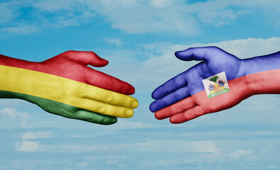 Haiti and Bolivia country handshaking with flags, consensus concept international co-operation illustration