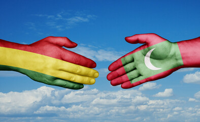 Maldives and Bolivia country handshaking with flags, consensus concept international co-operation illustration