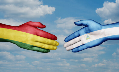 Nicaragua and Bolivia country handshaking with flags, consensus concept international co-operation illustration