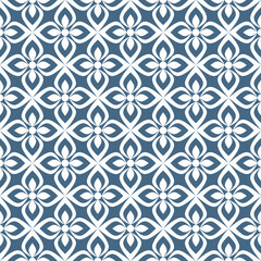 Beautiful seamless floral pattern, with white four-petal leaf shapes on a blue background. Suitable for various design purposes of textiles, tiles, wallpapers, backgrounds, etc.