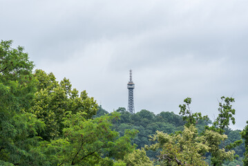 Obraz premium Petrin lookout steel framework tower built in 1891, resembling small Eiffel Tower, on Petrin hill in Prague, Czech Republic