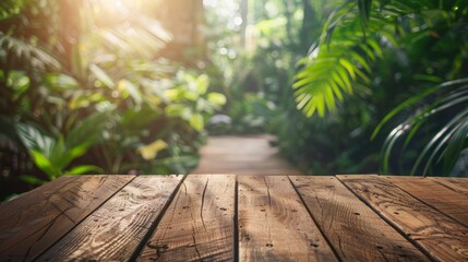 A wooden table sits in front of a lush, tropical forest, sunlight filtering through the foliage.
