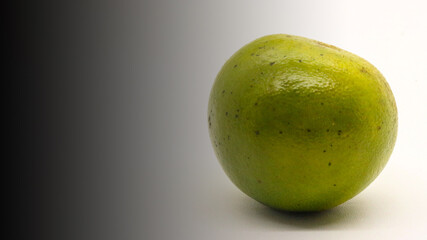 Orange fruit from Indonesia with a white background