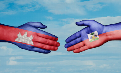 Haiti and Cambodia country handshaking with flags, consensus concept international co-operation illustration