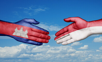Indonesia and Cambodia country handshaking with flags, consensus concept international co-operation illustration